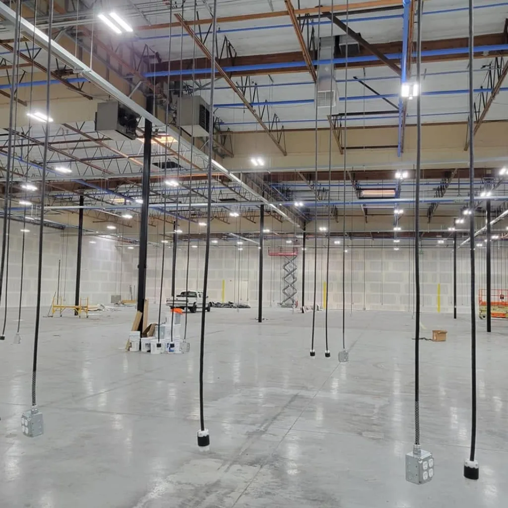 Industrial overhead power installation for warehouse tenant improvement Bay Area